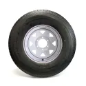 Castle Rock 235/85R16 12 Ply Radial Tire on 6 holes White Rally Rim